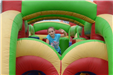 Young Girl Playing on a Bounce House