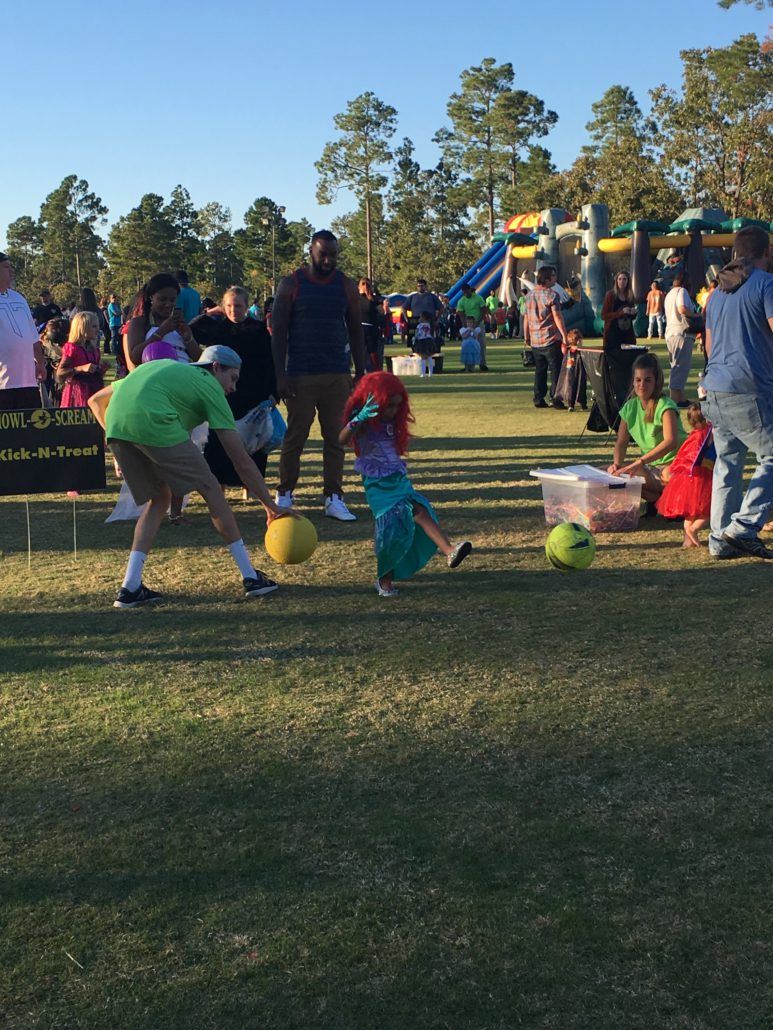 Children kicking rubber balls
